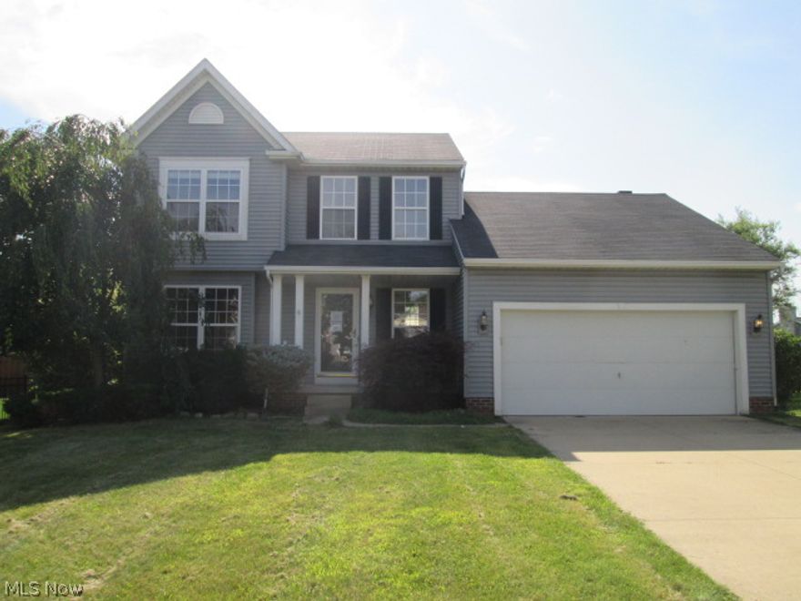 Spacious 3 bedroom colonial located in the Village of Coventry Crossing which is located across from Firestone Country Club and Firestone Metro Park.  Large kitchen with eating area that has sliding doors to a relaxing deck overlooking the back yard. Formal living and dining area. Spacious family room with wood burning fireplace Large master bedroom with walk in closet and full bath. First floor laundry room. Basement with two finished rooms. Central air for those hot summer days. Two car attached garage. Plus More!