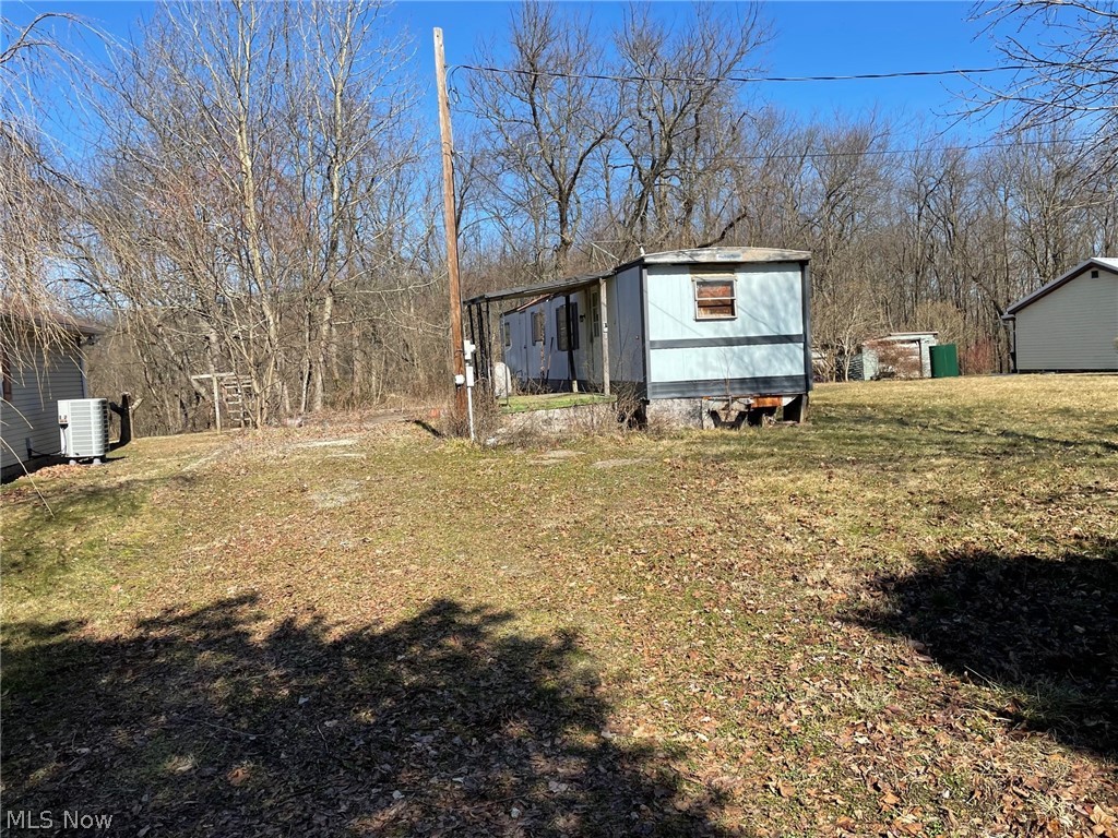 Great lot with public water, septic, and driveway. Call today for a private tour. The mobile home of is unsafe to enter and being sold AS IS