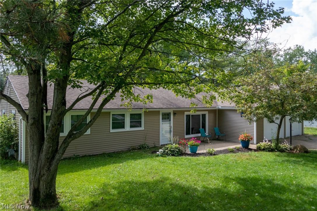 Wonderful and updated ranch home located in the Briar Root Manor development conveniently located to the schools, eateries and shopping. Newly sided in 2018 with low maintenance vinyl siding, all new energy efficient windows 2019, new steel front door 2018, roof is only 5 years new and the gutters only 4 years so the exterior is all set for your enjoyment & energy efficiency! Huge neighborhood yard offers plenty of room for gardening, entertaining & grilling and the shed is great for the yard & gardening tools & toys. Home offers a double driveway with plenty of area to park an RV, Boat or multiple vehicles and a grand size garage with its own 'man' cave or hobby shop complete with heat & electrical galore! The 3 bedrooms are one one end to allow for the active living space while others are sleeping, some new carpet as well! The large living room and hallway have new laminate flooring for easy cleaning & maintenance free! The kitchen has new trim throughout and has lots of storage and