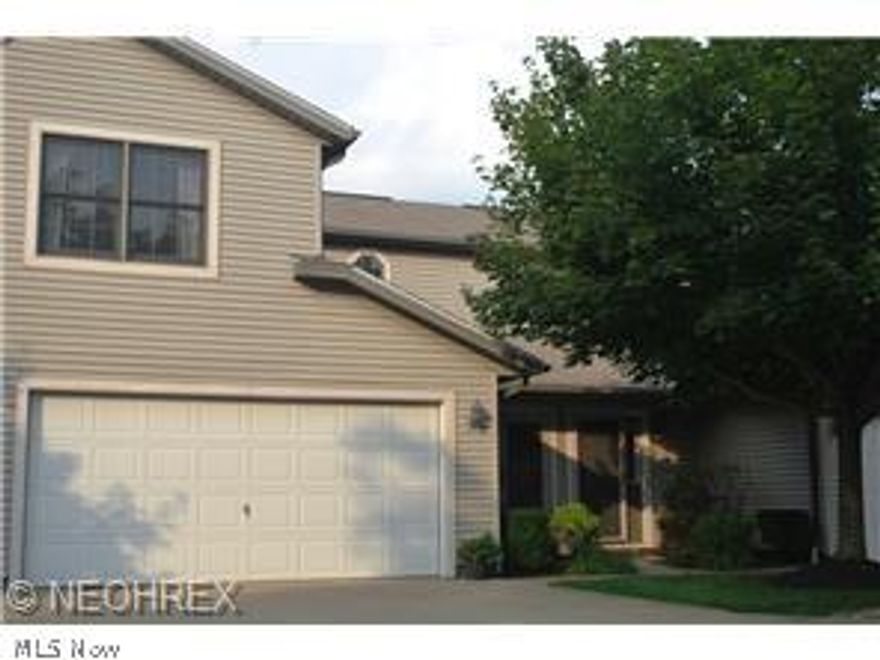 Lovely former model Townhouse  situated  in a small,  quiet and friendly complex. No city noise here.  Three large bedrooms,2.5 baths, formal dining room and an upscale kitchen. Kitchen complete with ceramic floor, Granite counter tops, stainless steel appliances and a  composite sink. You'll love the cozy family room with a patio doors that opens to an oversized , private patio overlooking a " garden like" backyard. Minutes to I-480, the Ohio Turnpike and Route 2. It's an easy commute to Downtown Cleveland, Hopkins Airport, Lake front amenities, Hospitals and shopping.  Seldom is there a 3 Bedroom with 2 car attached on the  market.  Spencer court has a very low turnover. Owners here tends to stay. Take advantage of the low Lorain county property taxes. Drive-by and see what the fuss is all about.