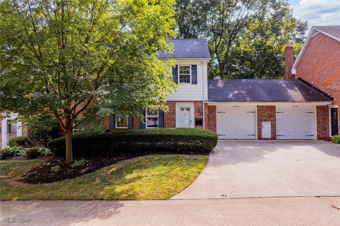 Welcome to this charming English Oaks brick townhouse condo located in the heart of West Akron, just moments from Highland Square. This beautifully maintained 2-bedroom, 1.5-bath home combines classic character with modern updates.
The first floor features an updated, fully applianced kitchen with quartz countertops and new LVT flooring (2020), a spacious dining room, and a newly updated half bath (2020). The inviting living room offers a cozy wood-burning fireplace framed by built-in bookcase hutches and opens to a private patio through sliding glass doors. Enjoy peaceful outdoor living under the new maintenance-free pergola, surrounded by lush landscaping and a large yard that provides a tranquil retreat.
Upstairs, you’ll find two generously sized bedrooms with beautiful hardwood floors, an updated full bath, and the convenience of a second-floor laundry with a newer washer and dryer that remain. Additional updates since 2020 include both bathrooms, main-floor flooring, fresh paint, and select lighting. Ample storage space completes this move-in-ready home.
Don’t miss the opportunity to own this charming West Akron townhouse with modern upgrades and a serene outdoor escape!