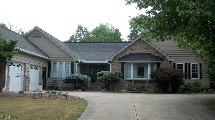 HUGE PRICE REDUCTION, Welcome to this sprawling 2800 square foot ranch on a 1.2 acre wooded lot offering a private wooded backyard. Enjoy cooking in the very spacious kitchen with plenty of Oak cabinets, island, breakfast bar and service desk. Kitchen opens to great Family room with wood burning fireplace, also leads to relaxing sunroom that overlooks the backyard. Formal living room has a beautiful Bowed window, nice size formal dining room. Master bedroom is very large and has his and her closets and whirlpool tub, all rooms are very good size. Basement is 12 course can easily be finished but also great for storage. All appliances stay including freezer + washer and dryer. Nice double door side load garage. Off kitchen is a great sun room that over looks backyard.  Location is great for fine dining, shopping and only 20 minutes from Downtown Cleveland...... So much space a really must see. READ BROKERS REMARKS