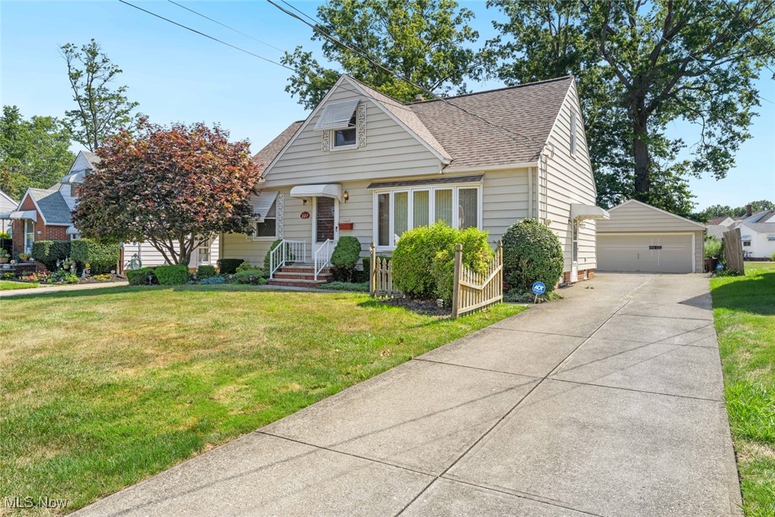 Welcome to this cute, nicely landscaped bungalow situated on the edge of Wickliffe and Willowick. With 1,891 square feet of thoughtfully designed living space, this home is a storage lover's dream! Every nook has been creatively utilized for maximum function. Don't miss the beautiful hardwood floors, adding warmth and timeless character throughout. The layout includes a first-floor master bedroom, a full bathroom, an additional bedroom on the main level, and two more spacious bedrooms upstairs. A cozy great room at the back of the home showcases a wood-burning fireplace, vaulted ceilings with wood beams, extensive cabinetry and a dry bar for family gatherings. Walk out the sliding glass from the great room to a generous backyard perfect for entertaining or relaxing. Downstairs, the partially finished basement offers even more living space, complete with a wet bar area, a second fully finished bathroom, a workshop, and a separate laundry room. A two-car garage includes a built-in workbench and an additional storage room as well as a back room with more attic storage space. Behind the garage, you'll find a shed offering even more storage. The ADT security system is easily transferred with no transfer or activation fees. The ADT security system was newly installed in 2024. Hot water tank was replaced in 2022. Roof, HVAC (with air purifier), and new kitchen floor were all installed within the last 10 years. This home combines charm, space, and location. Don't miss this opportunity!