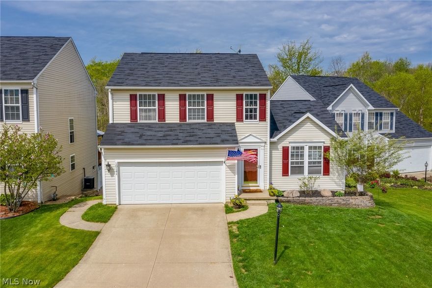 Absolutely Stunning 3 bedroom home located in Greentree Development in Streetsboro!   This home has been fully updated, with new vinyl floors throughout.  Large Vaulted living area greets you as you enter the home, opening towards huge kitchen, with plenty of cabinet space and large 2nd story deck.  Laundry area and 1/2 bath complete the first floor. Upstairs youll find large master suite, with walk in closet space and bath.  2 Additional large bedrooms located upstairs with another full bath.  Downstairs youll find a large open basement with a walk out area.  Situated on a quiet cul-de-sac road, This home is priced to sell and wont last long, call for your private showing today.