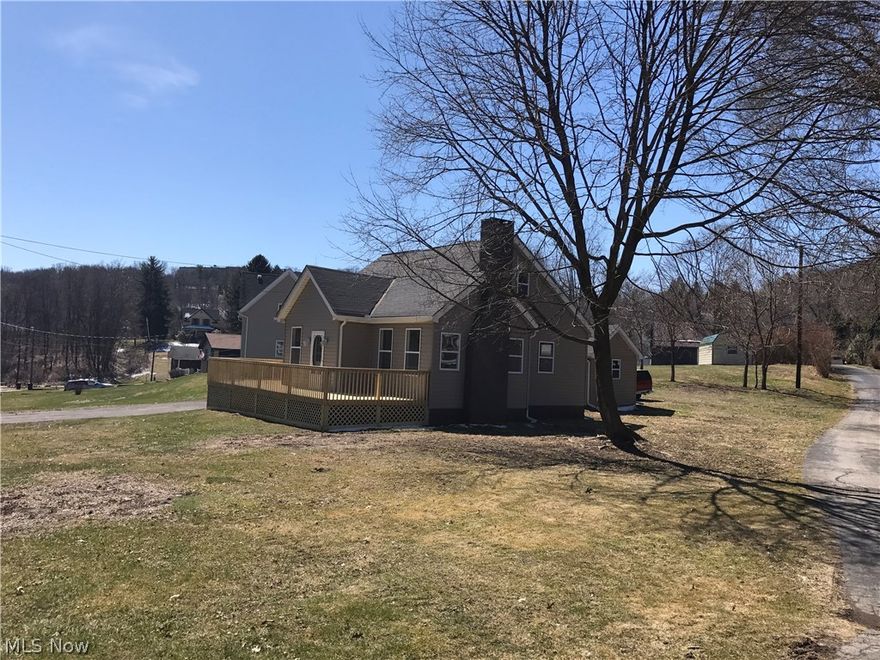 Be the first to live in this completely remodeled home.  Beautiful eat in kitchen with plenty of cabinet space. Tastefully chosen paint colors throughout the home. 2 BR on the main floor. Large 3rd BR upstairs. Cozy living room with a fireplace. All new windows. new water heater and 200 amp electric. Enjoy the warm evenings on the wrap around porch. Nothing to do but move in. Schedule your tour today