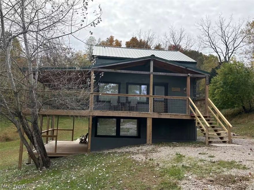 Welcome to this newly constructed cabin!  Three bedrooms, two full bathrooms on 1.85 acres.  Primary bedroom and full bathroom on lofted second floor.  Main level features kitchen, large living room with cathedral ceiling, mini split and walks out to a large covered deck.  Lower level Rec room with full bath and two bedrooms walks out to a covered lower patio.  Radiant heat in the floor and wall gas unit. WV Department of Health septic documentation, Mineral Wells Public water, Monongahela Power- electric, Mountaineer Natural Gas.