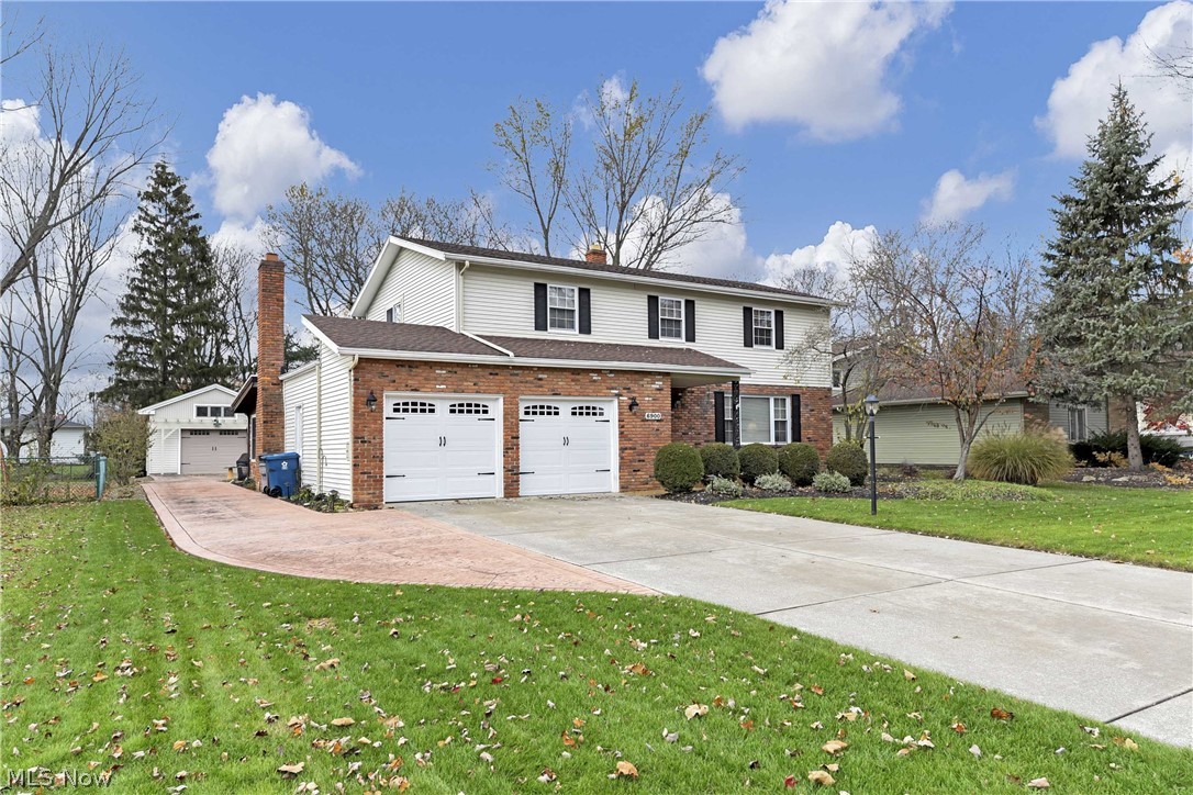 Amazing Colonial in the desirable development of Bretton Ridge! Foyer opens to a large Living and Dining Room. Remodeled kitchen with plentiful, high hickory cabinetry, recessed lighting, Swanstone double sink and laminate flooring. All major appliances remain. Eating area with bay window overlooking deep yard. Step down to the spacious Family Room with beam ceiling, peg-wood floor, half bath and full wall gas fireplace with raised brick hearth. Door to attached 2 car garage with Nature Stone flooring. Sliding back door opens to a huge 3-season room featuring brick and wood walls, berber carpeting and walk-out to additional patio space. Upstairs are 4 large bedrooms with wood floors. Master is oversized with a sliding door to rooftop sundeck. Basement is finished with paneled and painted walls, drop ceiling and berber carpeting. The unfinished utility side (with washer and dryer) also includes a large crawl area perfect for storing all those seasonal items out of the way. Then get read