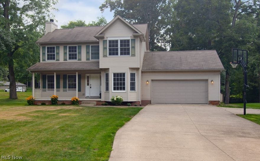 Welcome to 3946 State Rd! This beautiful family home is move-in ready and just minutes from Portage Lakes State Park where you can enjoy swimming, boating and all kinds of summer family fun! It has a full acre of land with plenty of space for outdoor sports, yet is nestled among beautiful trees for privacy and shade. Once inside, you’ll find comfortable places where your family can gather around a fireplace, eat dinner together or hang out and watch movies while not disturbing the rest of the family. The kitchen has tons of storage and counter space while the HUGE deck just off the eat-in side of the kitchen extends your living space to the outdoors and steps down to a concrete patio for additional entertaining space. The master bedroom has an ensuite with a walk-in shower and a walk-in closet. There is a spacious garage, a basketball hoop and a wide driveway with a turnaround area for your convenience and safety.  Close to practically EVERYTHING and less than 1.5 miles from Coventry e