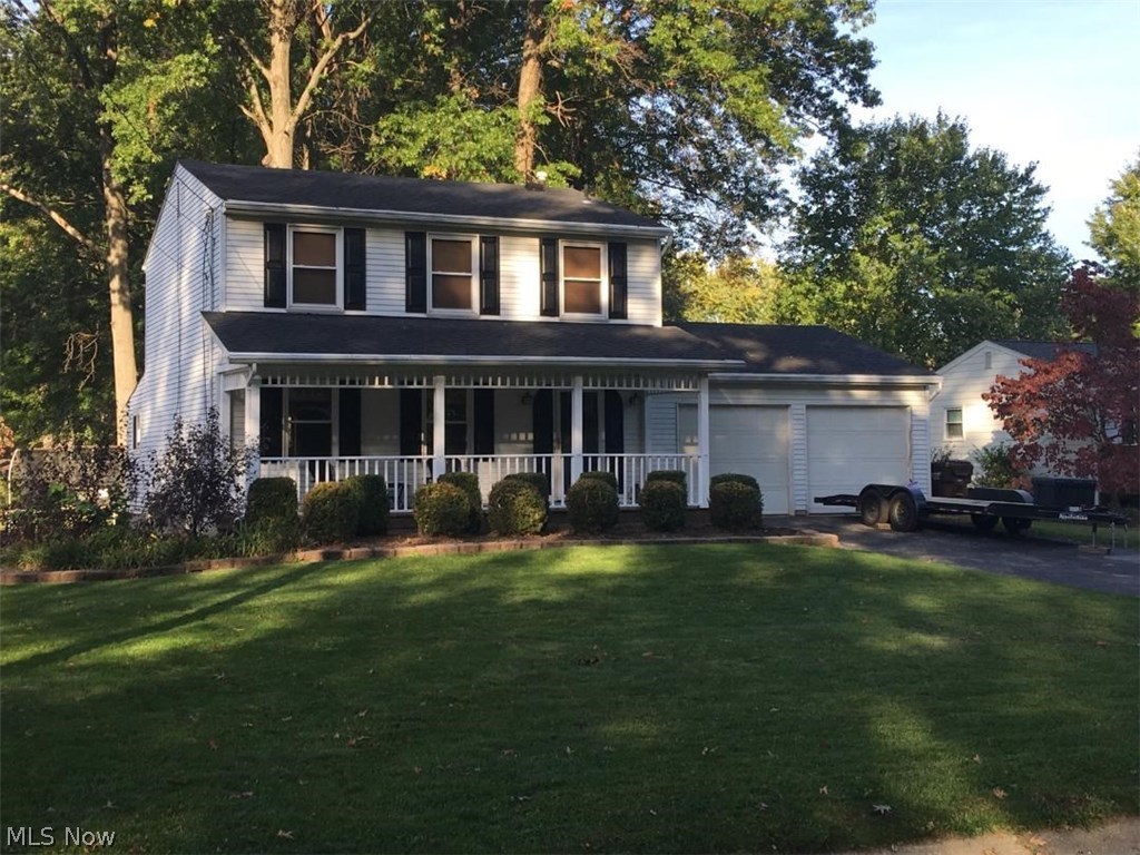 Nicely maintained 3 bedroom Colonial offers open kitchen/dining room w/newer stainless steel appliances & laminate flooring. Dining room sliders open to Florida room overlooking nice back yard. Three nice sized bedrooms on 2nd floor w/light ceiling fans. Large main bath. Master bedroom includes dressing area w/sink. 2 car attached garage. New roof & water tank in 2012, vinyl tilt-in windows.