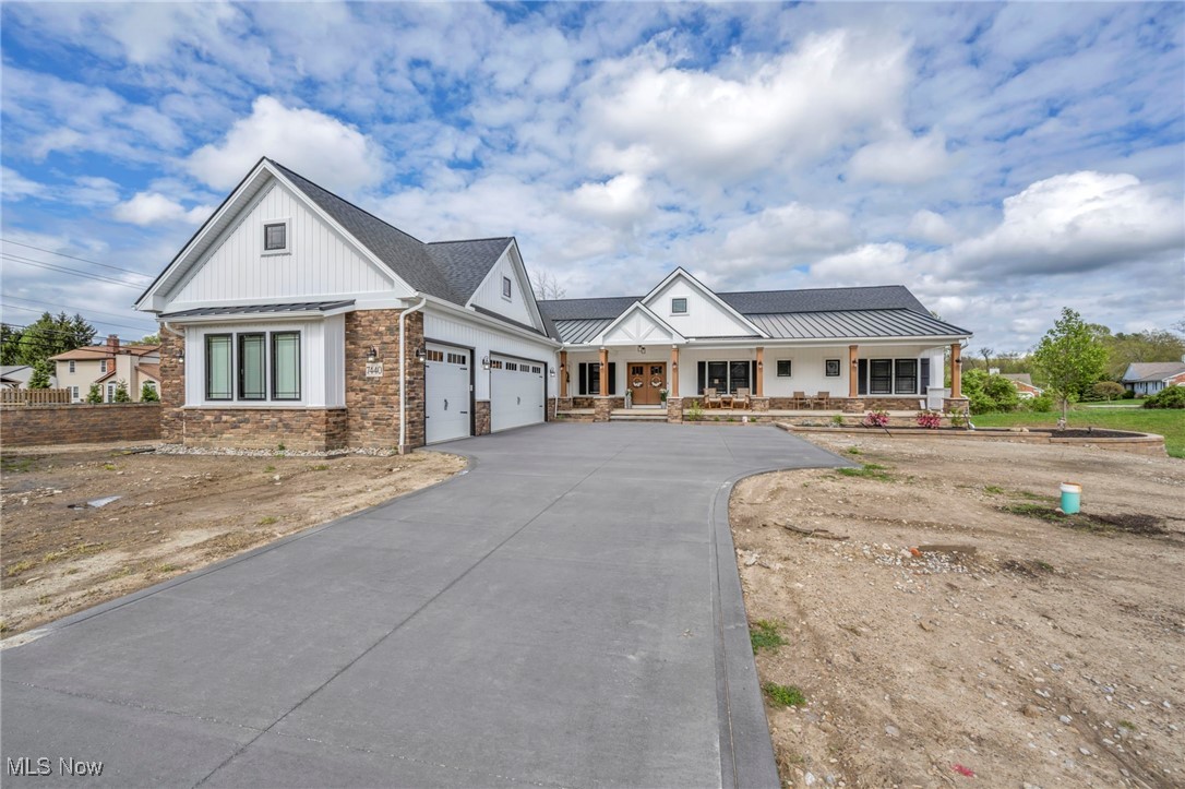 Welcome to this sprawling, stunning custom-built ranch with handicap accessibility throughout, completed in 2024, featuring a spacious 3.5-car garage with stairs leading directly to the basement. The covered front porch spans the entire length of the home, offering a warm and inviting welcome—perfect for relaxing and enjoying the outdoors.
Step inside to a beautiful foyer that opens into a breathtaking great room with vaulted ceilings and a gorgeous stone gas fireplace. The open-concept layout connects the great room, dining area, and gourmet kitchen seamlessly. The kitchen is a true showpiece, featuring a massive 8-foot island, an exquisite walk-in pantry, a custom serving dish closet, and high-end appliances that will delight any chef. The dining area sits perfectly between the kitchen and great room, ideal for entertaining.
The master suite is a private retreat with a luxurious bathroom and an expansive walk-in closet. Two additional bedrooms each offer private bathrooms and walk-in closets, plus a stylish half bath brings the total to 3.5 bathrooms. First-floor laundry with an abundance of countertops and cabinetry adds everyday convenience, and luxury vinyl wood flooring flows beautifully throughout.
The full 2,486 sq ft basement offers endless potential—it features massive windows that flood the space with natural light, 9-foot ceilings, and is already plumbed for a full bathroom, making it perfect for future finishing.
Outside, enjoy peaceful moments on the beautiful back porch, perfect for unwinding in your own private space. Every inch of this home has been thoughtfully designed for elegance, comfort, and functionality.