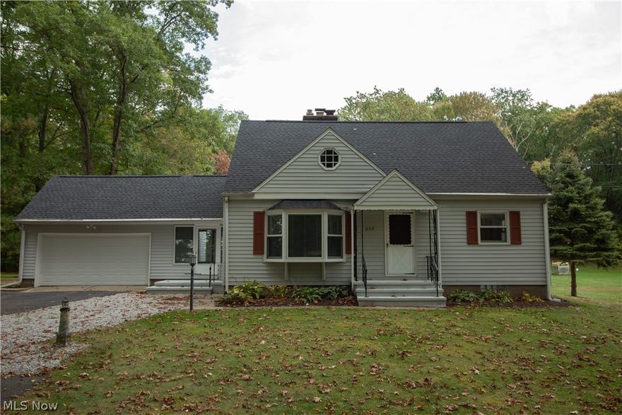 Great 4-bedroom Cape Cod on 1.3 acres of yard & woods on quiet street (deadends into elementary/middle school back parking lot/drive). Fireplaced Living Room w/large bay window, open to eat-in kitchen w/all appliances, has open "window" to the GREAT great room that has cathedral ceiling. 2 skylights, sliders to deck, & gas fireplace.  It can be a Family Room or combination w/Dining Room, big enough for both, w/magnificent view of the 30'x15' deck, backyard & woods!  First floor also has 2 bedrooms w/double closets & full, updated bath w/Corian sink & ceramic floor.  Upstairs is updated half bath & 2 more bedrooms, both w/2 closets.  One bedroom has unique possibilities as it has a wall going half the length, essentially dividing into 2 parts-could be bedrooms for 2 kids, kids room w/playroom, parents bedroom w/nursery, bedroom w/reading room or office or dressing room, you decide!!!  This bedroom also has built-in bookshelves.  There's also a walk-in closet w/shelving at the top of the