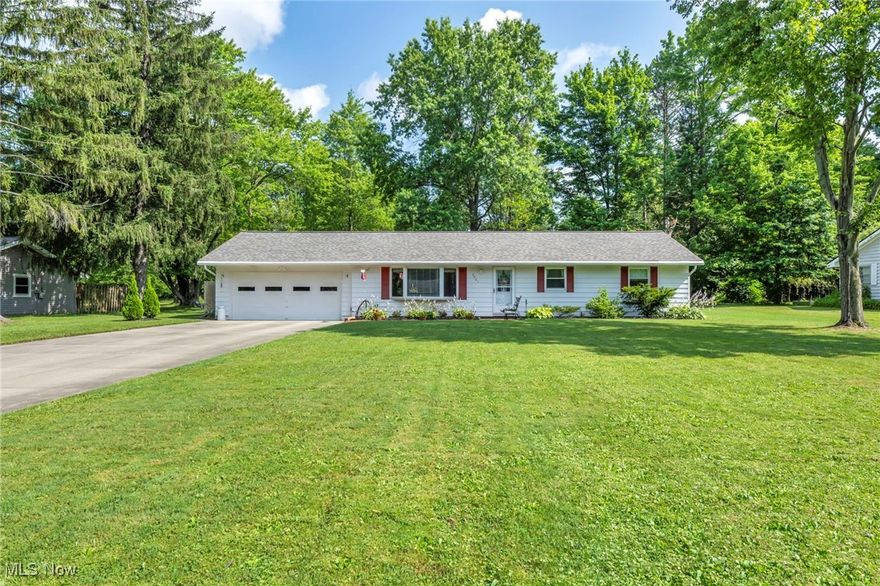 One-floor living at its finest in a highly sought-after North Hudson location! Tucked away on a quiet, no-outlet street, this well-cared-for & updated 3-bedroom, 1.5-bath ranch offers comfort, privacy, & convenience in one exceptional package. Home sits on a deep, beautifully landscaped lot with an updated, widened driveway plus an eye-catching brand-new dimensional roof, offering curb appeal & peace of mind for years to come. Enjoy your own private backyard retreat—fully fenced & lightly treed—storage shed, portable pool (easily removed if preferred), and a newer hot tub to soak your cares away year-round. Step inside through a premium front door into a naturally lit interior featuring updated windows & a spacious, flowing layout. Large great room is filled with warmth & charm, highlighted by a massive bay window & an included electric fireplace for cozy evenings. Kitchen will impress any cook with generous cabinet and counter space, updated appliances (all included), and a dining area perfect for larger gatherings. All three bedrooms are well-sized and conveniently located near the updated full and half baths. First-floor laundry room is complete with a sink and great workspace (new washer/dryer negotiable). Mechanically sound with a 6-year-old furnace, 3-year-old central air for year round comfort, gutter screens for easy upkeep, 3-year-old Culligan water softener plus reverse osmosis system at the kitchen sink. The attached oversized 2-car garage includes a nature stone floor coating for durability and a finished look. Newer thermostatically controlled power roof vent added. Immediate comfort, truly amazing yard, and a location that can’t be beat—don’t miss this rare affordable Hudson gem!