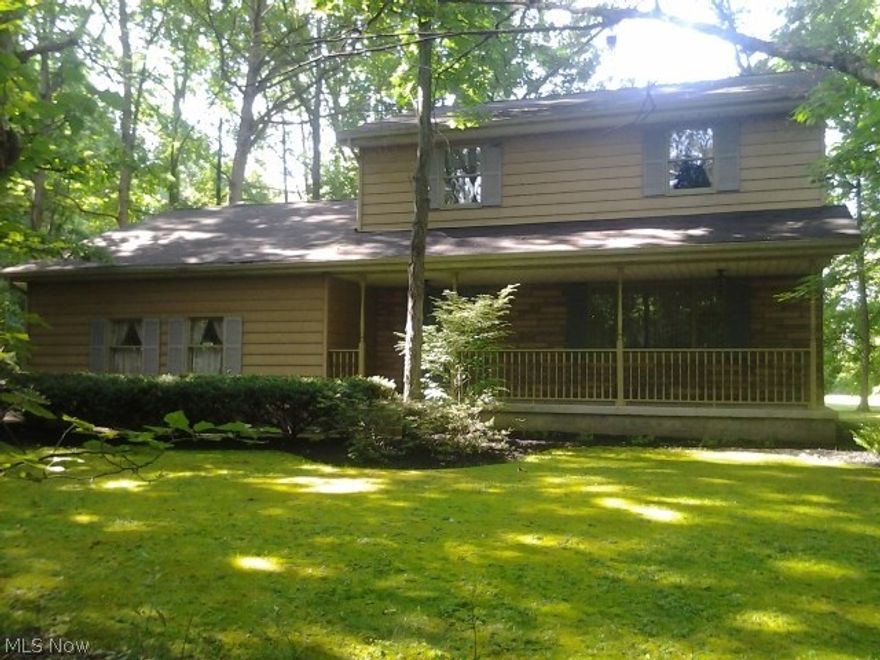 You want seclusion? You got it!!  This 3 BR, 1.5 bath colonial on 2.8 acres has 1,800 sq.ft. and is nestled right in the woods.  The cozy front porch lets you relax in the shade and the wide-open cleared back yard lets you enjoy all the sun you need!  Don't miss this one.