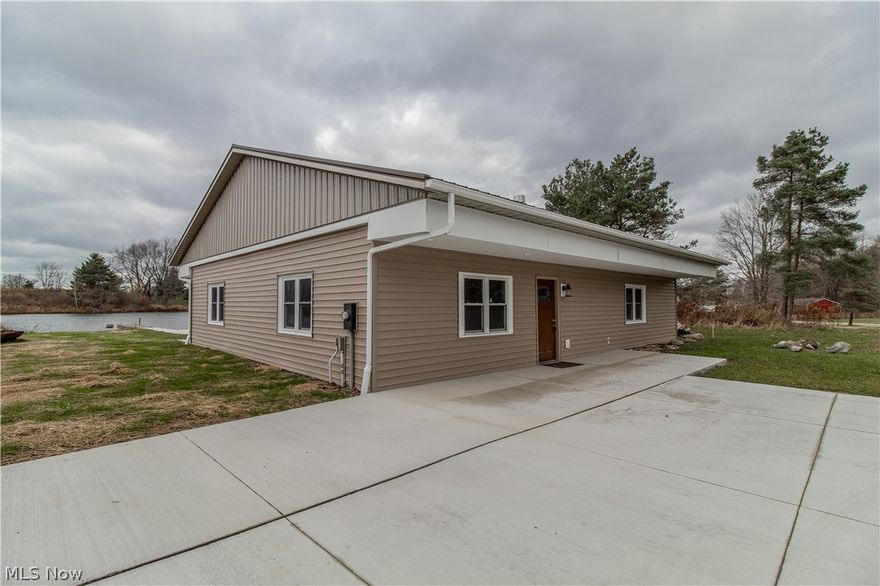 Outdoorsman's Paradise! Sitting over 800 ft off the road & surrounded by woods & water, this 2 bedroom 1780+ sq ft ranch has so much to love! There's a 3 acre private lake that features 3 fishing docks, a white sand beach & platform in the middle ideal for fishing/diving into the refreshing water on those hot summer days. 14 ft depth in the middle & loaded w/ 18 in+ Lg mouth, Sm mouth & catfish. The house has a hickory & granite kitchen w/ soft close drawers & cabinets + black stainless appliances. 2 spacious bedrooms, HUGE great room w/ XXL wood fireplace & hearth + a custom made live edge hickory mantle. The main bath sports a walk-in ceramic shower plus laundry area. The 14 x 20 master bedroom boasts a huge closet + doors to a concrete patio, walkway to a fishing dock + the beach & firepit. Vinyl sided exterior & new in 2020 metal roof. Also there is a 40 x 30 detached heated garage with water, in-floor heat, XL work bench and 4 overhead doors including a 10 ft door. A 560 sq ft fully furnished 1 bedroom 1 bath apartment above the garage adds utility to this unique property, while providing unmatched views from the second story deck & includes a full kitchen & stackable washer/dryer. The woods is filled with wildlife & has trails cut through for walks, 4 wheeler rides etc. With the open field beyond the garage, this property would make a fantastic horse property as well. Located less than 5 mins from Rt 11 & 7 mins to Rt 90 there's a lot to love here! Come take a look..