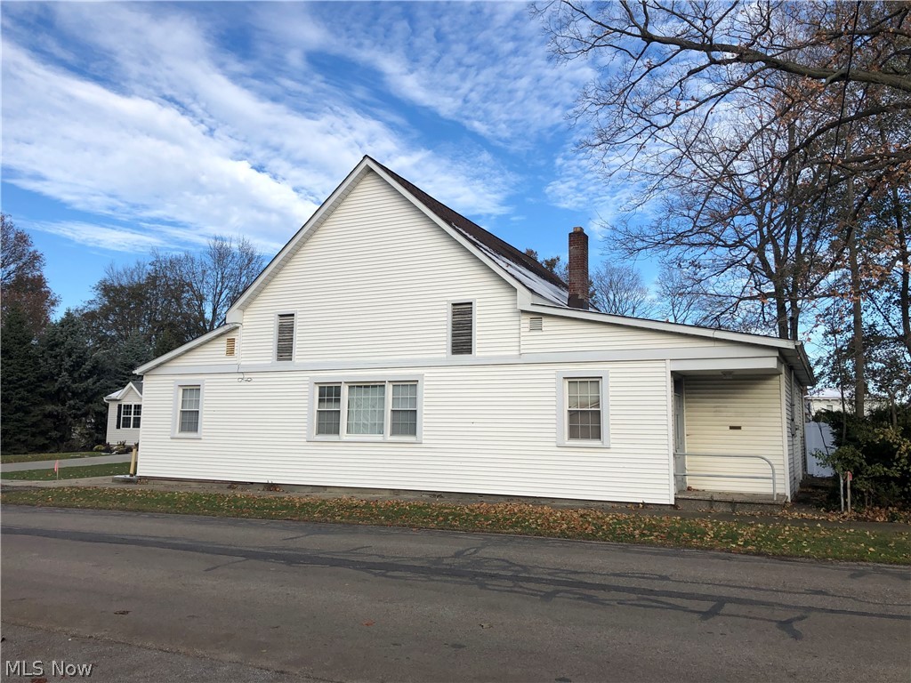 Great opportunity in the built-out “Old Village” neighborhood of Mentor. Put your ideas to work in this building that was the Historical Carpenter’s Union. The original structure was built in 1910 featured an impressive notch and timber constructed hay loft, while currently hidden, is still intact above a drop ceiling. It was remodeled in the 1950’s as a Credit Union. We have drawings developed by an architect that shows it re-imagined as a 4 -bedroom home. Or the seller will demolish the structure so that you have a blank slate to build your dream home. In any scenario, you will have a home on Historic Maple Street close to a variety of amenities.