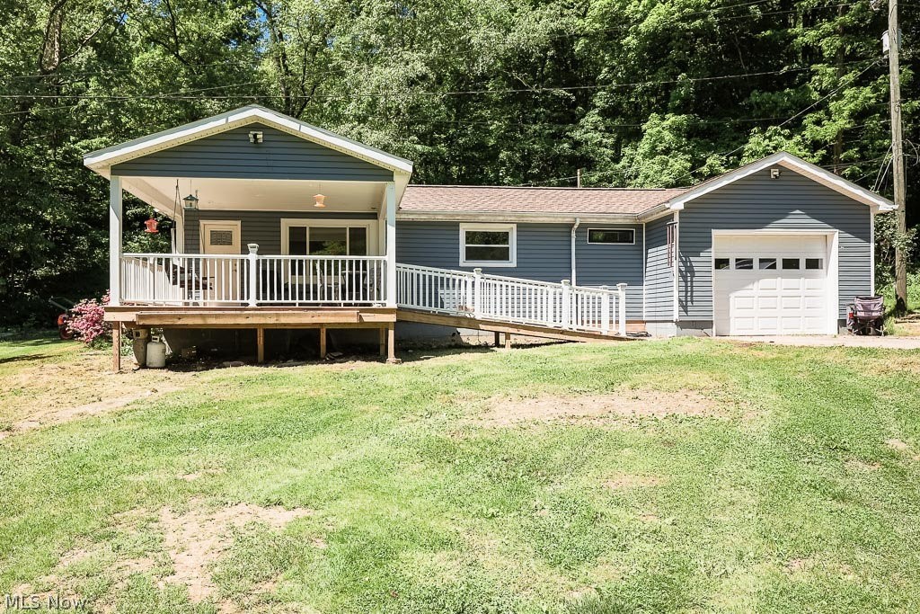 This beautifully remodeled home on 1.23 acres offers a serene setting with a treed view and a creek at the front of the lot. The house has been thoroughly updated, featuring a new asphalt roof, new floors, new windows, new drywall, and new exterior doors. The interior boasts a new deck, new garage door, all-new ductwork, a new heat pump, and central air. Additionally, there's a convenient new first-floor laundry and new trim throughout. The bathrooms have been newly remodeled, and pocket doors have been installed to maximize usable space. The kitchen is equipped with all new appliances, including a stove, refrigerator, and dishwasher. Outside, there is a one-car garage attached to the house, with space for 4-6 vehicles in the detached garage. This property combines modern amenities with a peaceful natural environment, making it a perfect retreat.