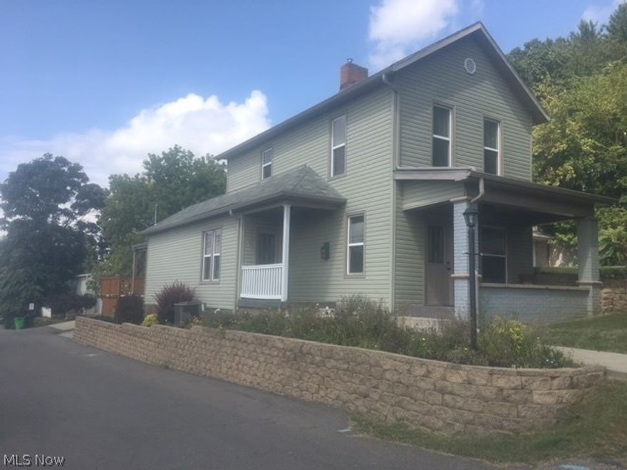 Exceptional home! Completely renovated within the last 6 years with quality and style at the top of the list. The outside of the home is very attractive and the colors used for the exterior are subtle and charming. The cottage style flowers and shrubs are highlighted with stone walls and  landscaping. A new concrete walk leads to the front and side porches. New doors, windows, hardware, vinyl siding, and gutters are all good signs of a maintenance free home for years to come. As you enter the home through the side entrance, you will be pleased with the spacious layout of the rooms. All rooms have professionally finished ceiling and walls. New & tastefully decorated light fixtures and woodwork is throughout the home as well as new floor coverings.  The cook in the home will appreciate the kitchen, with room to move, a functional layout, and loads of cabinets.  A serving window over looks the deck with easy access to those enjoying the benefits. The deck is partially covered for year rou