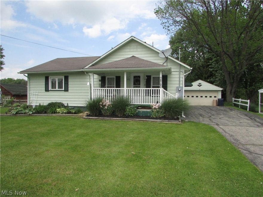 Welcome 10703 Newton Falls Rd, a move in ready ranch on 1.15 acres in a quiet country setting. This home features a spacious kitchen with plenty of counter and cabinet space (remodeled 2013), large bath, new carpet(2016), updated septic system (2012) and much more! When you walk into your new home, you will notice a wonderful layout which even includes a first floor laundry. There is great potential for a third bedroom in the basement. The patio (May 2013), 4 car heated garage and beautiful backyard makes this home perfect for entertaining. Schedule a showing today and call 10703 Newton Falls Rd home!