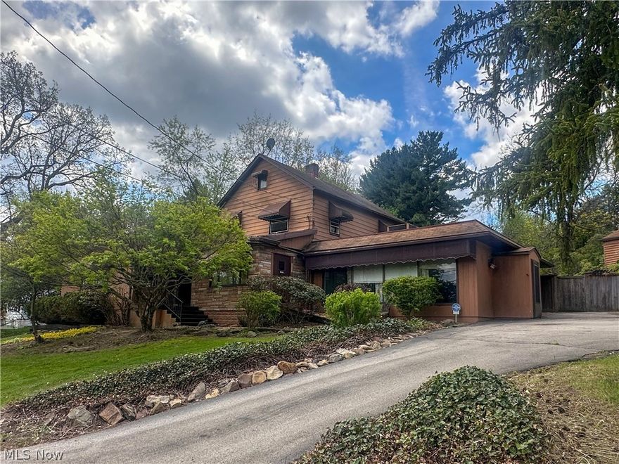 This is a great opportunity for someone who owns their own business and wants a short commute! Live in one side of this spacious four-bedroom home and work on the other! Formerly used as a florist shop with a nice storefront, coolers, workspace and kitchen, this is the perfect place to set up your small business. It offers plenty of parking, a two-car detached garage and two ways to enter/exit. On the other side, you'll find ample space to live and relax with a large living room, wood-burning fireplace, eat-in kitchen with appliances included, 3-4 bedrooms, 2 full baths, a basement, and a wonderfully private backyard with a covered patio and yard. Whether you're looking for a place to start your new business venture or just want a place you can stretch out in, you need to see this property. Opportunities don't come along like this often! Contact us today for a tour.