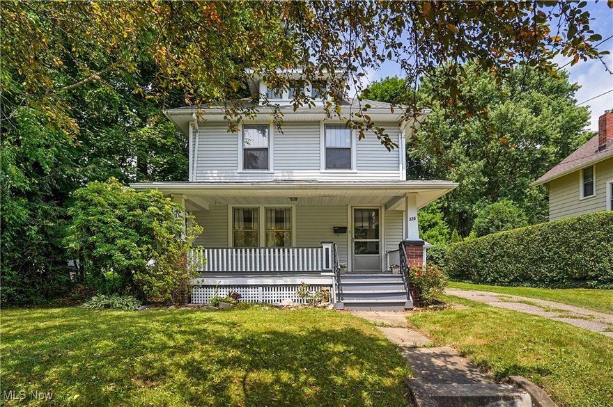 Charming Century Home in the Heart of Kent! Beautifully maintained and full of character, this inviting century home is nestled on a quiet dead-end street in the desirable Kent neighborhood. From the moment you step inside, you’ll appreciate the stunning woodwork and refurbished hardwood floors that add timeless charm to the space. The first floor features a custom maple kitchen (updated in 2003) the perfect layout for everyday cooking and entertaining. This kitchen is equipped with an electric stove, refrigerator, microwave, and dishwasher, and flows seamlessly onto a huge back deck overlooking the beautifully landscaped backyard perfect place for BBQing. Upstairs, you'll find a beautifully updated full bath with a relaxing Jacuzzi tub, two nicely sized bedrooms, and a spacious owner's suite complete with double closets. Other updates include: Roof with 30-year shingles '24, 150 amp electrical service '03, copper plumbing '03 and hot water heater '24. The basement offers an additional full bath and a convenient laundry area, canning cellar and a storage area adding extra functionality to the home. Enjoy outdoor living on the private back deck or unwind on the covered front porch—perfect for a porch swing or glider on a rainy evening. The property also includes a one-car detached garage and a storage shed.  Located just off State Route 43 near the Kent Roosevelt Natatorium, this home offers easy access to downtown Kent’s festivals, shopping, and dining. Don’t miss your chance to own a piece of Kent’s historic charm!