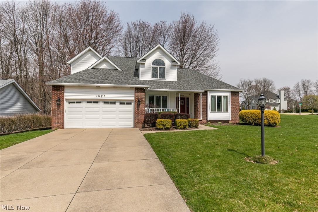 Welcome to this beautiful Colonial home in Stow! This home will meet all your needs with an open floor plan, first floor master bedroom, and finished basement! A charming front room that could be an office or sitting room with beautiful hardwood floors and a large picture window! Stunning updated kitchen with white cabinets, stone backsplash that accents the granite countertops and stainless appliances! Kitchen opens up to the large family room with two story ceilings and a lovely fireplace. Up stairs are three generously sized bedrooms and a full bath. You won't want to miss the finished basement which would make a perfect rec room. The backyard is your own perfect oasis to with a lovely deck to entertain on! This home is move-in ready for you!
