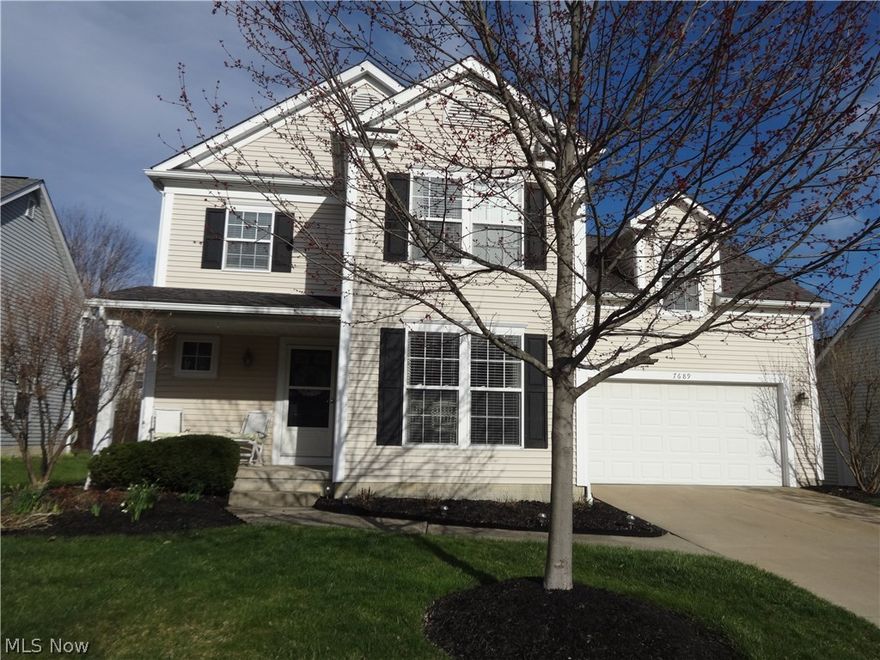 Amazing 4 bedroom colonial with 2 1/2 bathroom - with lots of charm!  Lots of light!  Open floor plan.  Welcoming front porch to enjoy a good book and beverage or watch the kids play in the front yard.  Foyer has skylight and a half bathroom.  Formal dining has built-in serving bar with storage.  You will love how the kitchen opens to the great room - great breakfast bar to gather at!  All kitchen appliances stay.  Great room has gas fireplace, and built-ins for added charm.  TV mounted above fireplace stays!  Sliding glass door off great room lead to over-sized deck with outdoor speakers for added enjoyment.  Partially wooded lot - complete with firepit!  Second floor features 4 bedrooms including master bedroom suite with dormer for added character and master bathroom.  Finished lower level provides additional living space for hobbies, recreation, office, and workout.  Plenty of storage.  There is even a finished room that could be used as a closet for seasonal items or as an office.