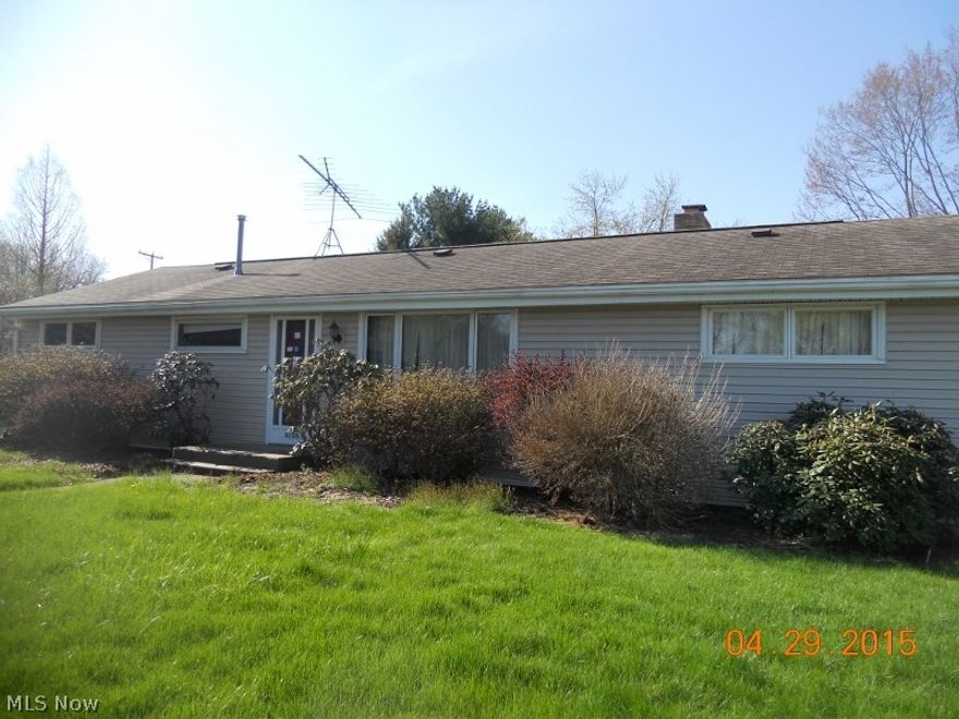 Nice Perry ranch with Great room with double doors to deck, Updated kitchen and bath. Appliances in kitchen. Lower level Family  room with frpl, 2 tier deck, storage shed large 2 car garage. (no plumbing)