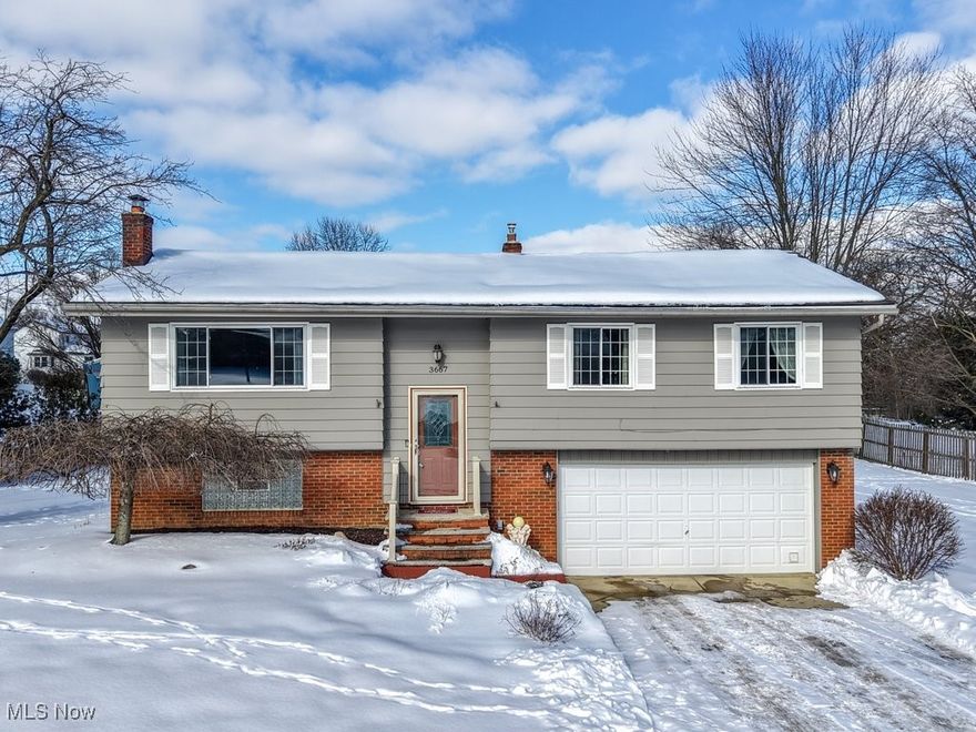 Welcome to this beautifully maintained 3 bedroom, 2 fully renovated full bath property situated on .71 acre lot in desirable Brunswick Hills Township - NO RITA TAX! 
Enjoy a spacious open concept layout featuring bright sunlight and a large kitchen with appliances, spacious dining room offers patio doors leading to the backyard balcony and deck. Spacious living room offers a stunning picture window! Newer laminate wood looking flooring throughout the first floor!  Three bedrooms and a gorgeous full bath on the main floor!  The family room is cozy with rustic wood looking Porcelain Tile flooring, a full bath and a bar area with mounted televisions that stay. Family room has a chimney flue for a fireplace. Perfect room for entertaining!  A walkout lower level patio door leads to the back patio and deck!  Backyard offers landscaping, newer gutter guards, electricity and a shed. The beautiful back balcony and deck has been recently updated!  Water system is rented from Culligan, they provide free services and there is a newer water pump and bladder tank!  Newer windows throughout.  Roof is about 12 years old.  Furnace and central air are serviced regularly and are in fine condition.  Newer hot water tank and home has 220 amp service with a 220 line for stove, dryer and outdoor use. This home combines comfort, updates and great outdoor space!  Excellent location to Pearl Road, shopping and highway access!  Call for your private viewing!