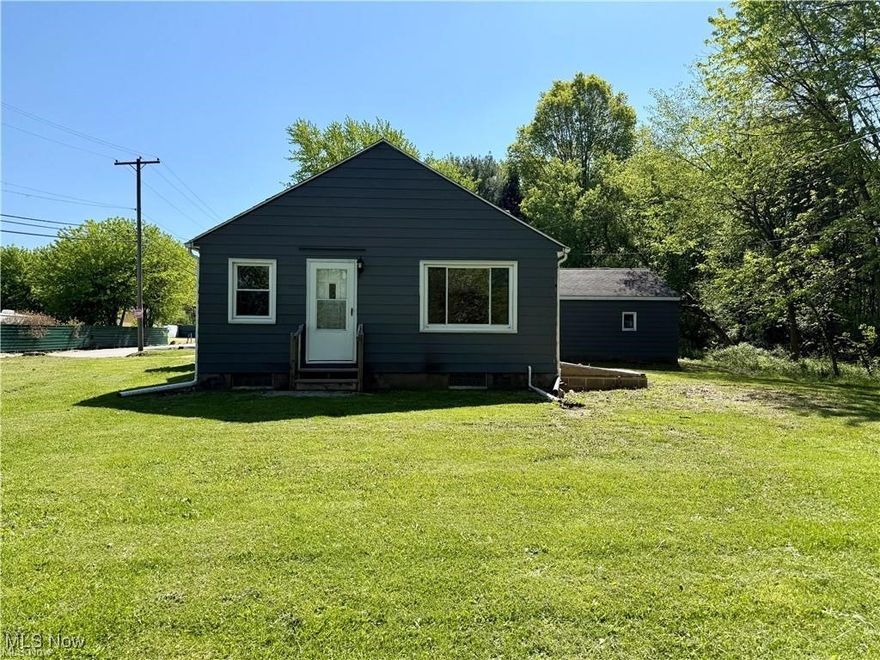 CALLING ALL INVESTORS --- CASH SALE ONLY. 3242 State Route 43 is ready for it's new owner. 2 bed | 1 bathroom with 764 sqft of living space situated on .72 acres within 2 parcels of land. Dual side by side garage + pole barn (4+ car garage) Pole barn is 24x32 totaling 768 sqft with sliding doors & the garage is 28x24 totaling 762 sqft --- that's over 1,500 sqft of storage space! Basement/Crawl Space. Spacious living room. Newer Electrical box, meter, sump pump, HWT, water softner system and duct work. Previously rented at $1,100/mo. Field LSD. The house and garages need TLC but now is your time to either get started on that investment portfolio, expand it or make this your own! CASH SALE ONLY -- Priced to sell!