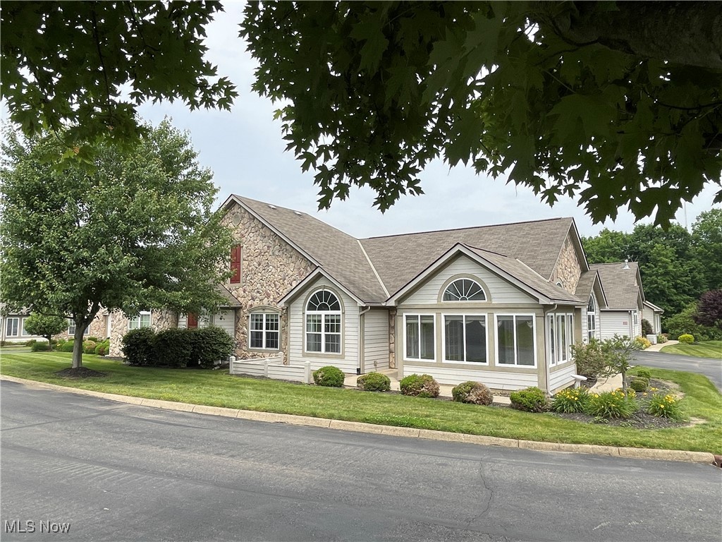 117 Colonial Woods Drive, Mt. Vernon. CANTERBURY (a favorite) FLOOR PLAN. The Village of Colonial Woods has heated pool, full clubhouse, & 24/7 exercise facility. $320/mo fees COVER WATER, SEWER, TRASH plus all outside maintenance, lawn care, landscaping and snow removal. $2000 Flooring Credit or Lowes Gift Card at closing. 1810 S.F., 3 Bedrooms, 2 full baths, Expansive sunroom, patio area, lots of light, large rooms, open floorplan, low-step shower with safety grab bar. Kitchen has loads of cupboards, buffet and large pantry. Lots of storage. Gas Log Fireplace in expansive living room/great room. NEW Fresh Paint throughout on 6/13. Conveniently located near shopping, dining, medical, yet a quiet country feel in historic Mount Vernon. Qualifies for HECM financing, with one down payment and no payment the rest of your life. Ask for details. Mount Vernon, chosen one of Ohio's Four Best Home Towns, 2017-2018, by Ohio Magazine. Quality of Life, Lower Taxes, Great Parks System and Bike/Hiking Trails, Community Concerts and Theatrical Groups, Great People and Community Pride... Less than hour commute to greater Columbus.