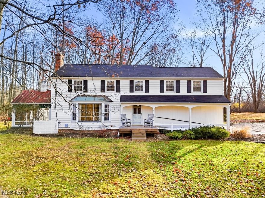 This flexible 4-5 bedroom Chesterland colonial is designed to grow and shift with you. it’s perfect for multigenerational living, blended families, or anyone craving a home that adapts as life evolves. Step into a living room where a gas fireplace wrapped in custom built-ins sets the tone for holiday moments, slow mornings, and the calm rhythm of daily life. The kitchen offers generous storage & prep space with an eat in nook. The formal dining room flows into a dreamy screened-in porch—an indoor/outdoor hideaway for coffee, cocktails, or late-summer dinners. Just beyond, the fenced patio opens to a wide, open lawn that feels like your own private park. A heated in-ground pool—freshly painted in ’24 and enhanced with new handrails and a bar—anchors the backyard, inviting pool parties, neighborhood chili cook-offs, or a sunset float. What makes this property especially rare is the flexibility of the floorplan: a true first-floor primary suite option with an ADA-compliant full bath and walk-in closet added in ’23, perfect for aging parents or anyone who wants main-floor living. Or, use the same area as a spacious family room with a picture window framing the pool and wooded backyard. Upstairs, 4 bedrooms and 3 full baths offer everyone their own retreat, including TWO large ensuite bedrooms with modern bathrooms and 2 additional bedrooms served by another full bath. The lower level—freshly waterproofed in ’25—provides excellent storage and a second laundry area. Throughout the home, the updates tell a story of thoughtful care: 200-amp electrical service (’23), whole-house Generac setup (’24), driveway sealing and coating (’25), new sulfur guard and pressure tank (’24), new front deck and ramp (’24), and responsible tree removal (’25). Set on a beloved street just east of Gates Mills and within top-ranked West Geauga Schools, the home is as practical as it is soulful—ready for the next chapter, the next generation, and every version of “family” you bring with you.