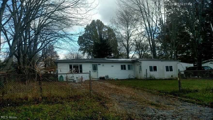 Loads of potential in this larger ranch style home with for bedrooms.  This home features 4 bedrooms, large living room, first floor laundry, and more! With a little bit of work this would be a great place to call home!. Sold As IS.