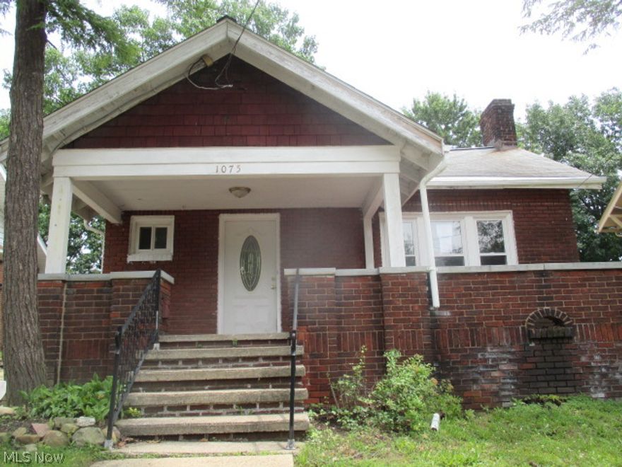 Charming ranch located in North hill. One floor living at it's best with a very open floor plan. Open living room and dining room with wood burning fireplace, built in bookcases and hardwood floors. Large bedrooms and bathroom. Kitchen with separate eating area. Enjoy the evening on the spacious front porch. Full basement with ample storage space and glass block windows. Younger replacement windows throughout. Younger garage. Plus more! Great location, near schools, parks, shopping, transportation and highways.