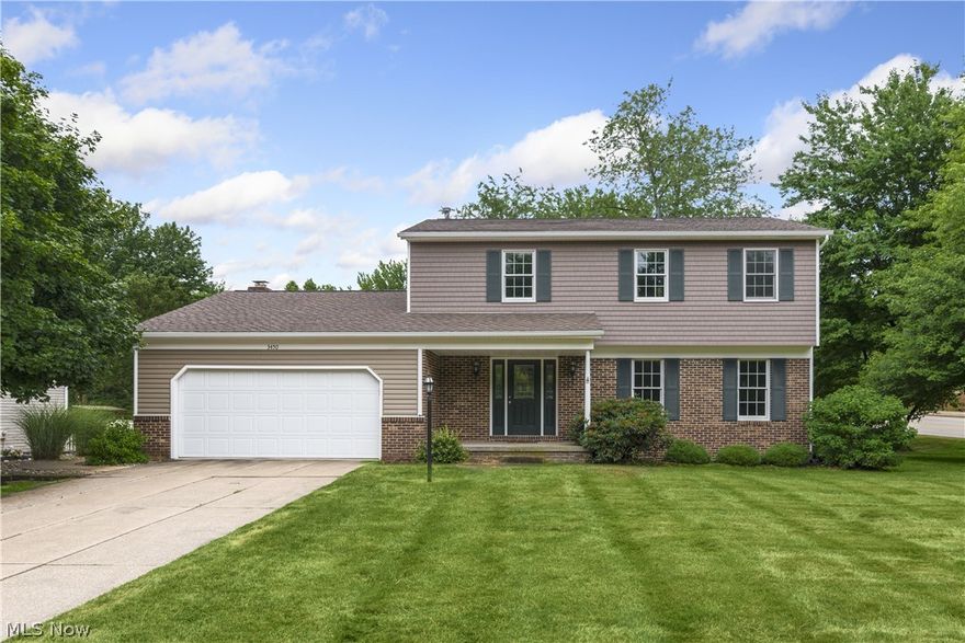 Turn-key home in the heart of Fairlawn! Come and enjoy all the updates and personal touches this amazing four bedroom, three bath home with almost 3,000 sq. ft. of livable space has to offer. Upon entry, you will be wowed by the newer hardwood floors, clean trim, crown molding, wood beams, and fresh paint. Step inside the kitchen with granite countertops, newer appliances, tile backsplash, and bright new lighting. The newer renovations allow the kitchen to be fully open to the family room. A spacious living room and dining room with wood paneling and crown molding complete the space. The second level features four large bedrooms and two full bathrooms. The master suite has newer paint, newer carpet, and a compete bathroom renovation with granite countertops, ceramic tile shower with glass door, and oversized shower head. The lower level has a huge rec room, bar, and even your own personal workbench area. Get a load of the beautifully-landscaped private yard and outdoor living space fea