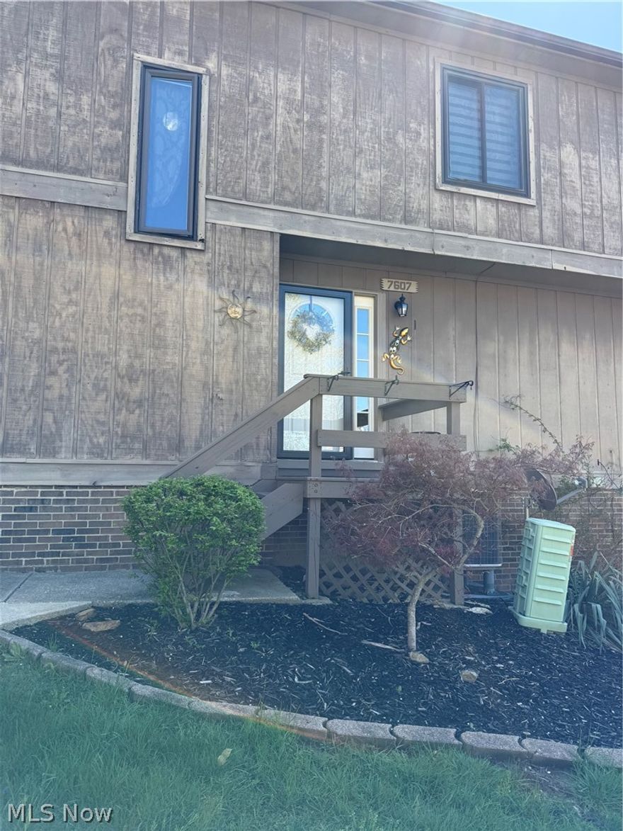 Welcome to this charming 2-bedrrom, 2.5 bath condominium nestled in the desirable Chaunticlair community of North Royalton. Tucked away for added privacy, this home offers peaceful setting while still being conveniently close to shopping, dining, and everyday amenities. The main level features an open-concept kitchen, living, and dining area- perfect for keeping everyone connected during gatherings and entertaining, The spacious primary suite includes a full en-suite bath, walk-in closet, and a private balcony- ideal for enjoying your morning coffee or relaxing at the end of the day. The lower level adds even more versatile living space, complete with a walk-out patio, a separate laundry room, and additional storage. Whether you're a first-time homebuyer or looking to downsize, this home offers comfort, convenience, and a welcoming layout- truly a must see! 2018 updates- All kitchen appliances, bamboo flooring in the living room, ceramic tile in the kitchen and entrance area. **HVAC, 2023 updates- new front door. 2025 updates bathroom flooring, lower level flooring/stairs. 2026 updates- New lighting lower-level.