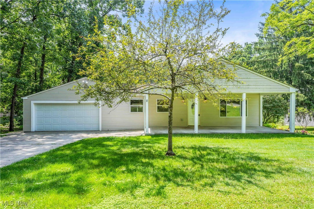 Welcome to this beautifully maintained ranch home nestled on a serene, tree-lined acre on the outskirts of Hudson, Ohio. Offering the perfect balance of privacy and convenience, this property features expansive front and back porches ideal for relaxing or entertaining while enjoying the peaceful natural setting.
Inside, you'll find three spacious bedrooms and three full bathrooms, all thoughtfully designed for comfort and functionality. The heart of the home is a bright, open living area that flows seamlessly into the dining space and kitchen, perfect for both everyday living and hosting guests.
The walk-out basement adds exceptional living space with a generous recreation room—ideal for a home theater, game room, or second living area. A large separate storage zone offers flexibility for hobbies, crafts, or workshop space.
Car enthusiasts and hobbyists alike will appreciate the oversized garage outbuilding, offering ample room for vehicles, tools, or additional storage.
This is your chance to enjoy one-floor living with extra space to spread out—just minutes from Hudson’s charming downtown, top-rated schools, and quick access to nearby highways. Discover comfort, space, and natural beauty in one of Northeast Ohio’s most desirable locations. Welcome home!