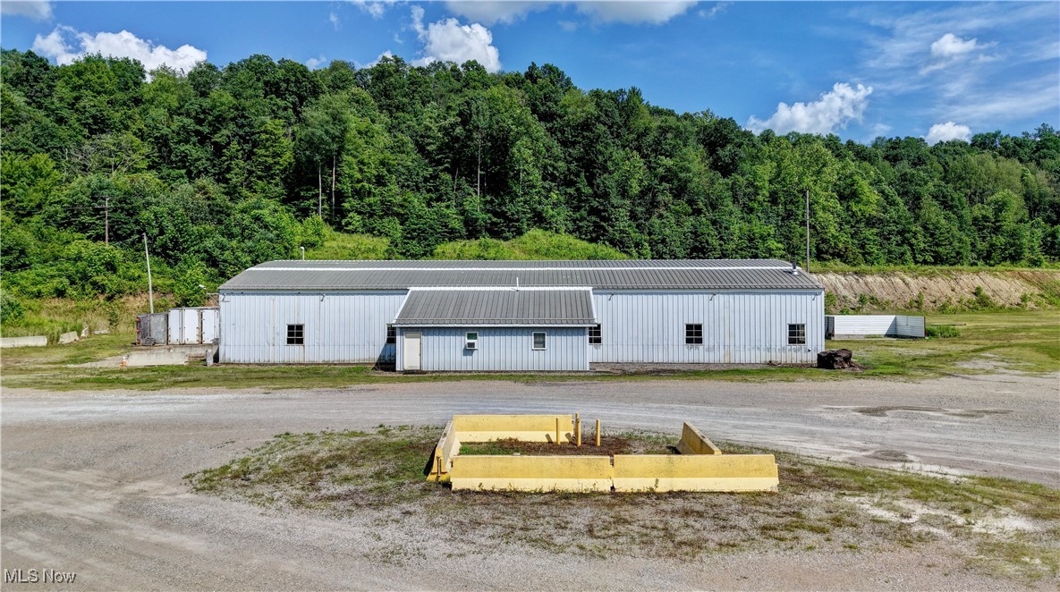 Location, Location, Location! Prime Warehouse Opportunity in Uhrichsville, OH!
Discover the perfect space for your business with this expansive 10,144 sq ft warehouse, conveniently located just off US36 outside of Uhrichsville, OH. This versatile property features two office spaces, two bathrooms, and is equipped with well and septic on 10+ acres. This property is equipped with 3-phase power, natural gas heat, a 2-ton overhead hoist system and air compressor. There is also a large parking/lay yard area with a large wash bay. Whether you're looking to expand your storage capabilities or streamline your logistics, this warehouse offers the flexibility and convenience you need. Don't miss out on this incredible opportunity—call your realtor today to schedule a tour and see it for yourself!