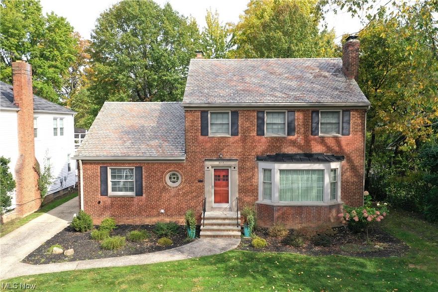 4113 Washington Blvd, University Heights, Ohio 44118 is a stunning home WITH location, location, location in the beautiful & highly sought community of University Heights, kindly known as the city of beautiful homes! Great close proximity to John Carroll University as well as beautiful local parks & eateries, coffee shops & outstanding world-renowned medical facilities! This home features 4 spacious bedrooms plus a bonus room (currently utilized as a yoga room but could serve as a 5th bedroom or guest suite or family room if desired) w/ 4 bathrooms, 2 full & 2 half baths. Recently finished hardwood floors & great natural sunlight highlights this gorgeous home w/ rear deck & 2nd floor balcony, rear entry 2 car garage! Brick Colonial w/ charm, gorgeous trim & freshness of updated beautiful Tuscan feel kitchen, granite countertops, travertine backsplash, gorgeous lighting, great layout, & bistro coffee breakfast room. Awesome Dining Room w/built in cabinetry & French doors to sunroom leading to rear deck, huge Living Room w/ fireplace flanked by windows & gorgeous front bow picture window & arched openings, again with natural stunning hardwood; half bath is conveniently located between entry & 1st floor bedroom, currently utilized as an awesome study office. Up to the 2nd floor, stop at the Bonus Room & the beautiful hardwood continues into 3 main bedrooms w/ both full bath & half bath en suite! Don't forget finished basement w/ another en suite & Family Room w/ 2nd fireplace!