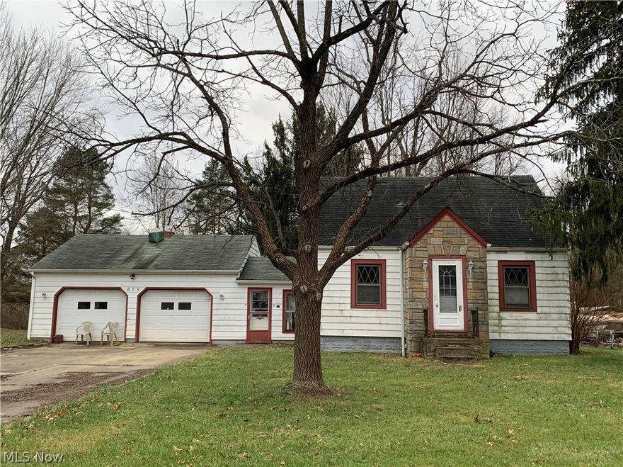 Handi-man special waiting for you! The first floor has a living room, dining room, and kitchen. There is also a 3 season room. Also on the  first-floor is a bedroom and bathroom. Upstairs can be 1 or 2 bedrooms. There is a  2 car attached garage and 2 sheds on just under 3 acres.