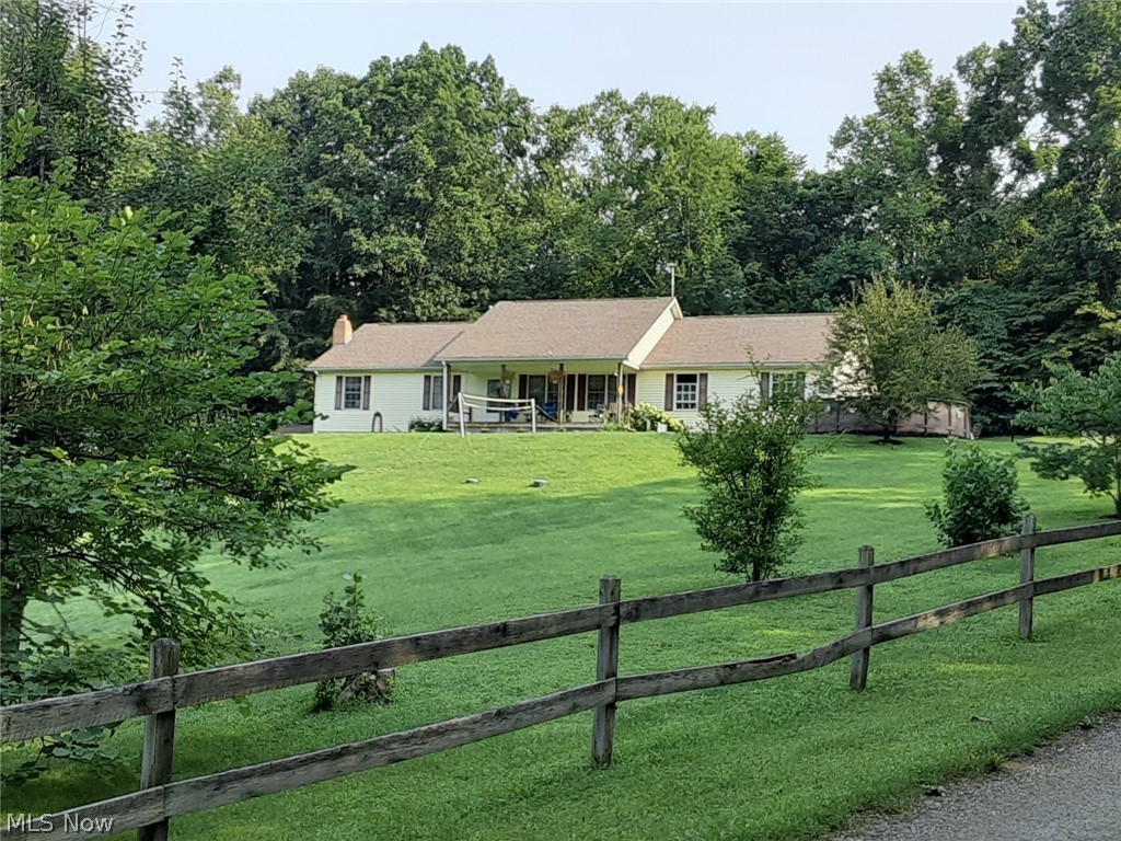Enjoy the country and be close to town. This 5 bedroom 2 bath home sets on just over 6 acres with a concrete drive, oversized 2 car attached garage and an above ground pool. If you need space, look no further. Don't wait, this home is ready to move into.