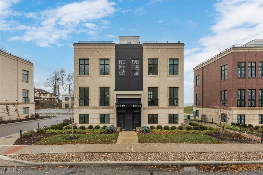 Nestled along the tranquil shores of Lake Erie, this (like) new, never occupied high end townhouse offers over 2,100 square feet of luxurious living space, designed to capture the breathtaking lake views from every angle. With an emphasis on sophisticated lakefront living, the home boasts high-end finishes, expansive windows, and premium amenities throughout. Inside, you’ll find a seamless blend of modern design and comfort, including spa-inspired bathrooms and a chef’s kitchen outfitted with top-tier Wolf and Bosch appliances.

The second floor serves as the heart of the home, featuring an open-concept layout with 10-foot ceilings, a striking marble-clad fireplace, and floor-to-ceiling windows that flood the space with natural light. The gourmet kitchen is a showstopper, featuring a spacious island, sleek quartz countertops, and a full suite of professional-grade appliances, including a Wolf steam and convection oven.

The third floor is home to two well-appointed bedroom suites, as well as a conveniently located laundry room. The primary suite is a true retreat, complete with a walk-in closet and a spa-like en-suite bath. A third bedroom on the first floor offers flexibility, ideal for use as an office or guest room.

The crowning jewel of this home is the expansive rooftop terrace, offering panoramic views of Lake Erie perfect for outdoor entertaining or simply unwinding in the serene surroundings.

Located in the desirable 700 Lake of Rocky River, this exceptional property is just minutes from recreational activities, parks, shopping, dining, and a quick 15-minute drive to downtown Cleveland. Why wait to build, when this value-added condo is ready to move in today!