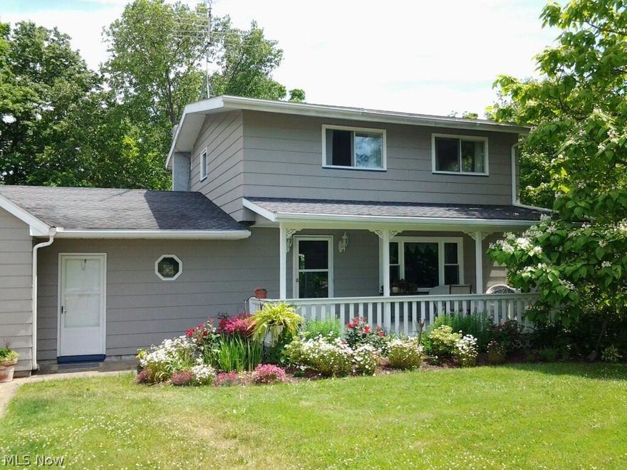 This 3 bdrm., 2 ba. home is absolutely charming. Nestled in an open and wooded setting on Mill Creek, nature is at your doorstep. Gently wooded area in back retains its natural beauty, but has been refined for your enjoyment. Gorgeous window views from kitchen, sunroom bedrooms and deck. Sunroom off eat-in kitchen is a great retreat to enjoy the outdoors. Can have 2 living areas or large dining room. Family room has wood stove. Nice basement partially finished. 2-car garage has stairs to second floor for storage, playroom, studio, etc. Nice sized-2 story shed has plenty of room. Front porch lends itself to entertaining, friends, that morning retreat-or evening relaxation. As you can see, this home and its surroundings is a real gem!