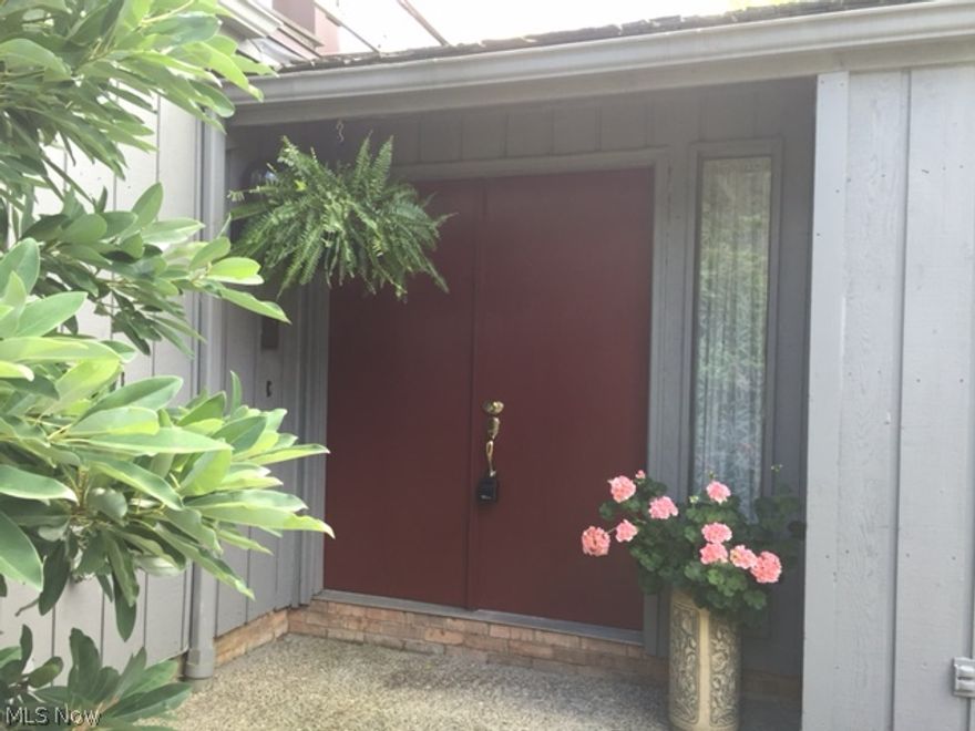 Move in condition. Light filled Kitchen updated with granite, stainless appliances, cabinets, double ovens, breakfast bar, and flooring. Large Dining Room with sliders out to a private patio. Vaulted ceiling in Great room, fireplace wall with built ins, wet bar between Great room and upscale Library/Office, with built in shelving, that has a beautiful pond view.  1st floor Master bedroom has 2 walk in closets and a pond view. 2nd Bedroom on 1st floor.  Large Living suite upstairs with Bedroom, full bath and private deck, also with pond view.  Enjoy the private patio and lawn while listening to a soothing fountain. Bonus outdoor patio perfect to pot your plants in or to use as outdoor work area. Large 2+ car Garage has separate garage door for your golf cart or motorcycle and is heated and air conditioned for a place for all your projects. NO STEPS on the 1st floor! This condo has tons storage on both levels plus a large attic above the Master Bedroom.