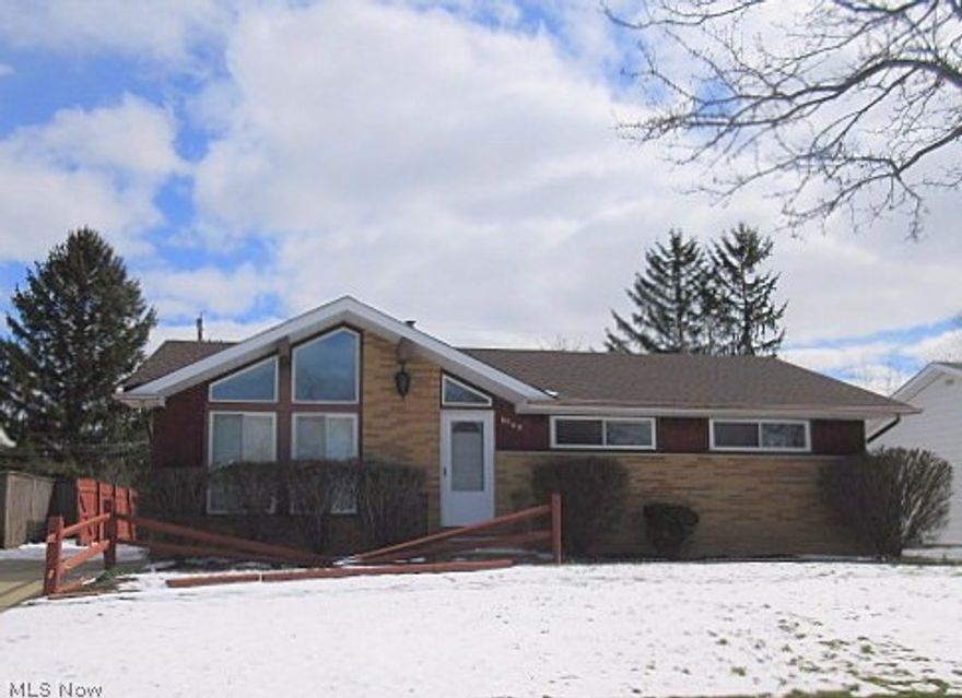 Spacious 2528 Square Foot Ranch, including Huge Finished Rec. Rm on Lower Level all on .49 Acres in Parma Hts. Vaulted Ceiling Living Rm w/New Carpet & Fresh Modern Paint. Dining Room w/New Carpet, Fresh Modern Paint & Sliding Glass Doors to Half Covered Back Deck. Eat In Kitchen Includes Fridge & Built In Oven plus Built In Eating Area. Three Nice Size Bedrooms w/Hardwood Floors & Fresh Modern Paint, all w/Decent Size Closets.  Remodeled Half Bath off Master plus Additional Full Bath in Hall.  41 x 15 Finished Lower Level Includes Large Bar, Pool Table and Built In Fish Tank.  Additional 16 x 11 Storage/ Work Out/Office on Lower Level. 18 x 11 Laundry Room Includes Washer & Dryer and Plenty of Storage Space. Two Car Garage Plus Large Storage Shed.  TWO Parcels are combined for a Total of .49 Acres.  Electric 100 amp 2018, Roof 2011 HOME WARRANTY INCLUDED! Great Price for a Great Property!