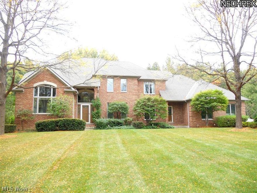 This Grand Home sits on 1.02 Acres and features a Two Story Family Room w/gas-wood FP. Large Kitchen w/oak cab,desk,pantry & GE Blk Profile appliances.Brand new ceramic tile & sink!Swing door to Formal Dining Room w/wainscot & tray ceiling.Hardwood Flr in Liv Rm & Din Rm. 1st Floor Master Suite w/huge walk in closet 7x13 plus Vaulted Bath 13x15 w/whirlpool tub, shower & his & her sinks.1st Floor Laundry.New carpet!Two staircases to second floor!Balcony overlooks Two Story Family Room. Lg bedrooms upstairs w/walk in closets and access to full bath from each bedroom! Upstairs hall has built in desk area w/shelving. Home has 2 furnaces w/zoned heating. 2 Cen Air Units,hot water tanks & sump pumps! Huge finished Rec Rm in Basement 25x25! Spacious 3 Car Side entry garage. Driveway alert alarm! Brick patio w/view of woods! 1 Yr Home Warranty offered with this home!