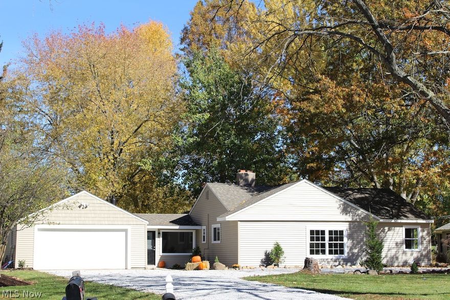 WOW!!! Don’t miss out on this immaculate three bedroom two bath Hudson ranch!  Situated on a golf course this home is just seconds from all that historic Hudson has to offer.  As you enter you are immediately drawn to an enormous great room with panoramic views of the back yard and expansive Lake Forest Country Club.   With a sixteen foot Anderson sliding door leading to a concrete patio and cozy sunroom there are plenty of spaces to enjoy the views.  There are loads of updates throughout this home!! The kitchen is open to the living area and features brand new stainless appliances, new cabinets with soft close drawers and granite countertops.  Also, off the kitchen is a large pantry with built-in shelves.  Both bathrooms are nicely remodeled with tile floors, marble counters and new fixtures.  There are three nicely appointed bedrooms with large closets.  The master bedroom boasts over 350 sq ft with a fireplace and a walk in closet.  Call now to schedule a private showing.