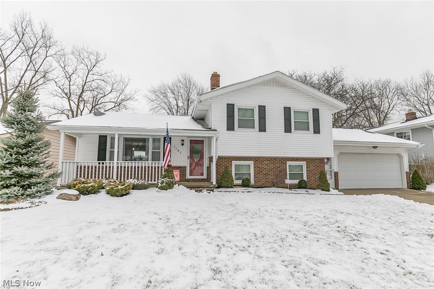 This home has been well cared for and pride of homeownership shows throughout. Inviting living room features a large bay window and newer laminate wood flooring. The open floor plan flows nicely into the dining room which is perfectly located directly off the kitchen. The updated kitchen boasts newer cabinets, counter tops, ceramic back splash, stainless steel appliances, and recessed lighting. The breakfast bar offers casual seating, built-in wine bottle storage, and pendant lighting above. Step down to the lower level and relax in the spacious family room, which features new sliding glass doors to the concrete patio in the back yard, recessed lighting, and surround sound speakers. Also on the lower level is the fourth bedroom with French doors, and a half bathroom with a pedestal sink, ceramic tile floor, and wainscoting. Upstairs you will find the master bedroom with newer carpeting, the second bedroom, and third with a beautiful full wall of distressed wood. The full bathroom upsta