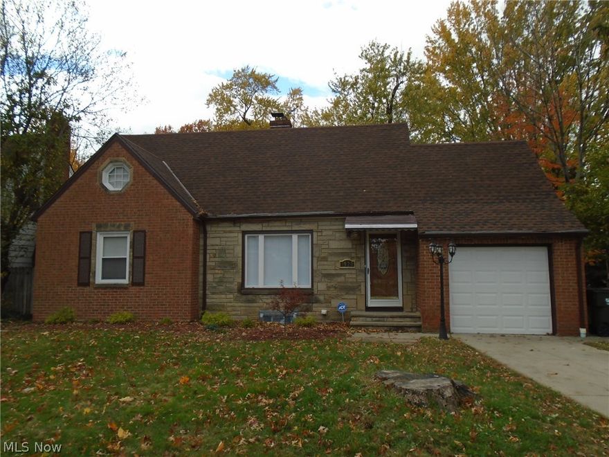 Fabulous brick ranch in park-like setting in Euclid. Two BRs on first and large master on 2nd with plenty of closet space. Beautifully restored full bath with tiled floor and shower/bath surround.  Updated kitchen with granite counters, Mosaic tile backsplash, natural wood cabinets, and newer stainless steel appliances!!  Enjoy privacy in the back yard with mature trees and spacious deck. Finished recreation room in basement for perfect play room or man cave. Newer roof, flooring, fixtures and so much more! Welcome Home!