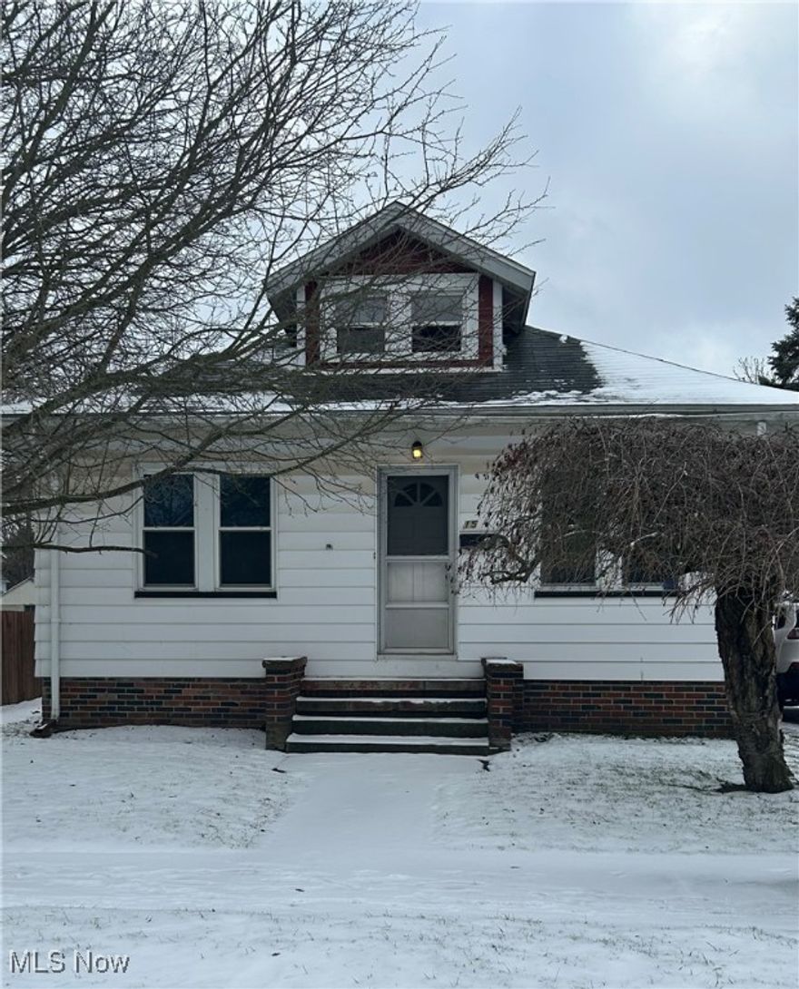 Beautiful brick home with one floor living.  Attic space upstairs unfinished.  Two bedrooms with a possible third that is currently an office space.  Large dining room and living room.  Hardwood floors throughout.  Mud room off of the kitchen.  Full basement with canning room and work bench area.  Back yard has a cement pad off of back door perfect for grilling. Major updates include central air/furnace and windows. Roof about 8-10yrs new. Come check this one out as all the big updates are done!