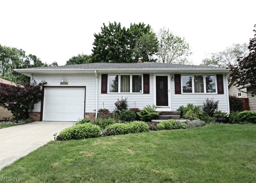The moment you step on the new stamped concrete step to this extremely well maintained Ranch, you know that this home is better than most. Walk in to find a rare open floor plan for a mid-century modern home. The large living room opens to the dining room and nicely appointed kitchen. The beautiful hardwood floors are perfect for today's buyer. The 3 bedrooms on the main level, as well as a bonus 4th bedroom in the lower level, can accommodate a large family. Add to all of this a large lower level family room and you have all of the space your family will ever need. Walk through the expanded 2-car tandem garage to a large stamped concrete patio overlooking a fenced-in, meticulously landscaped back yard. This home is perfect for the buyer who just wants to move right in and start living. There is nothing to do but enjoy. Given the condition and amenities of this home, it may well be the best value in the area. Don't miss out!!